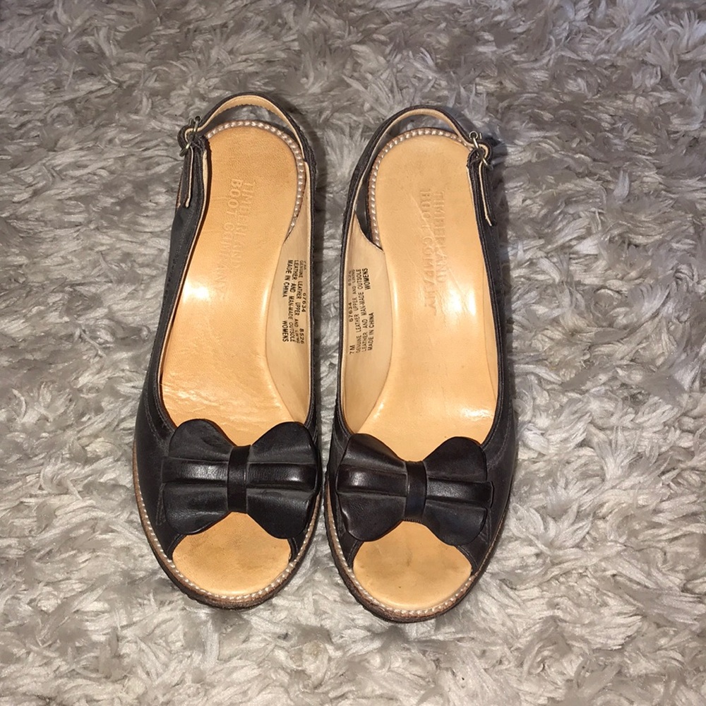 Black bow wedges